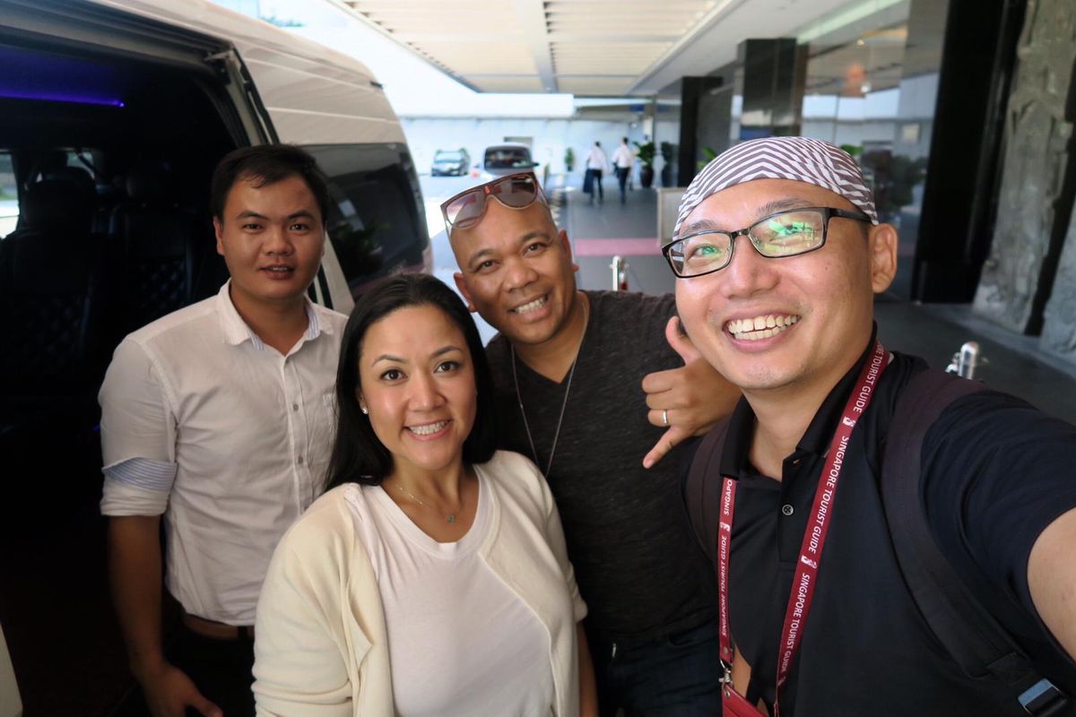 Happy travellers with their SKO driver after an airport pick-up