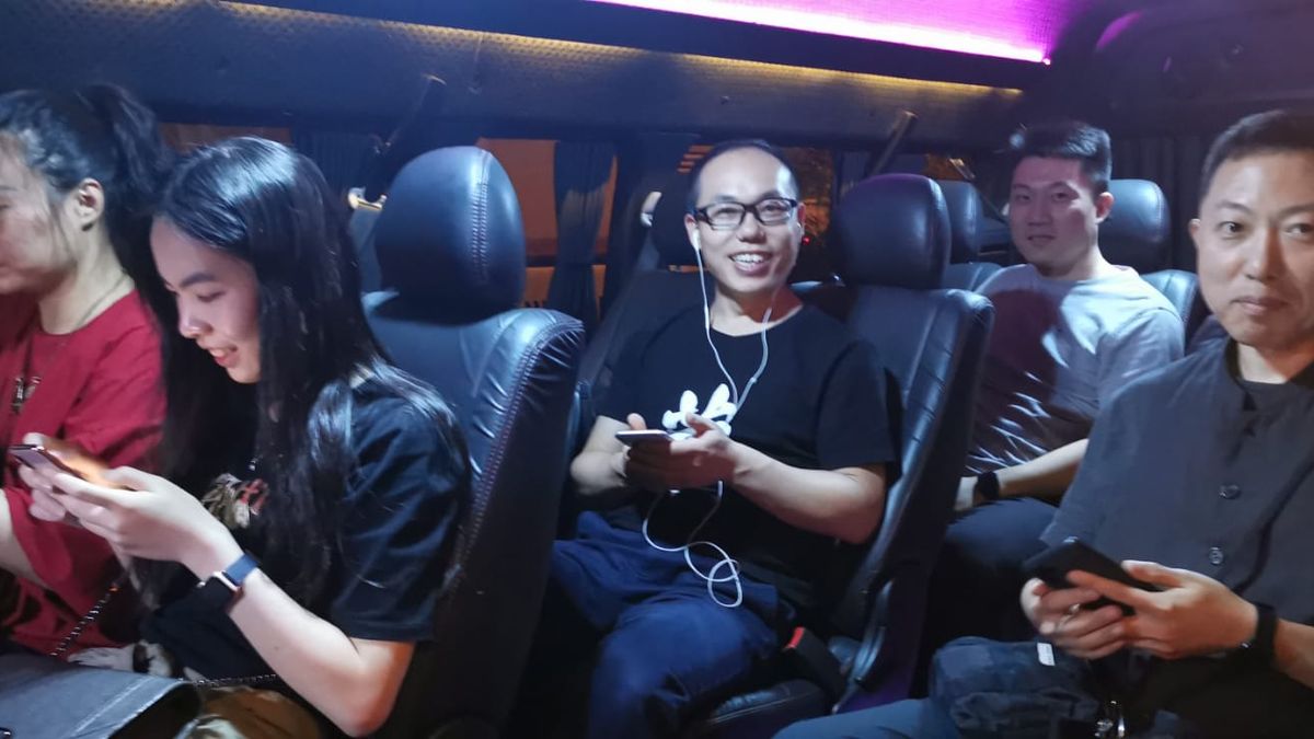 A group of friends relaxing inside an SKO minibus