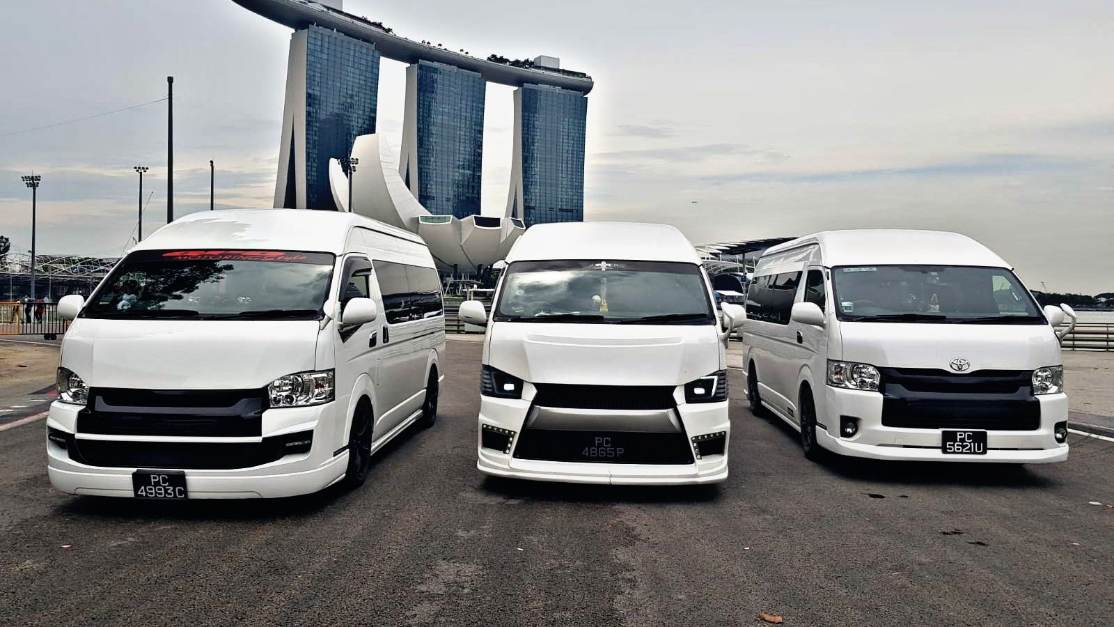 SKO Limousine maxi cabs lined up in front of Marina Bay Sands, Singapore
